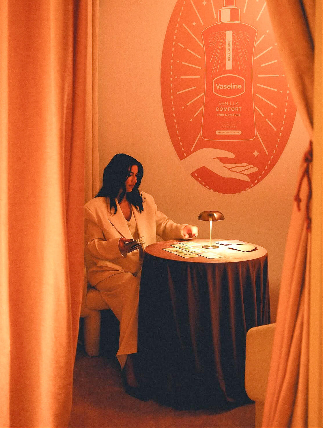 Tarot by Alexis reading cards during Vaseline's Date Night launch in New York City.